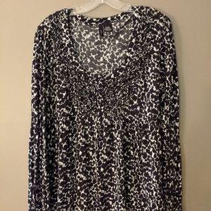 Long sleeved smocked baby doll top